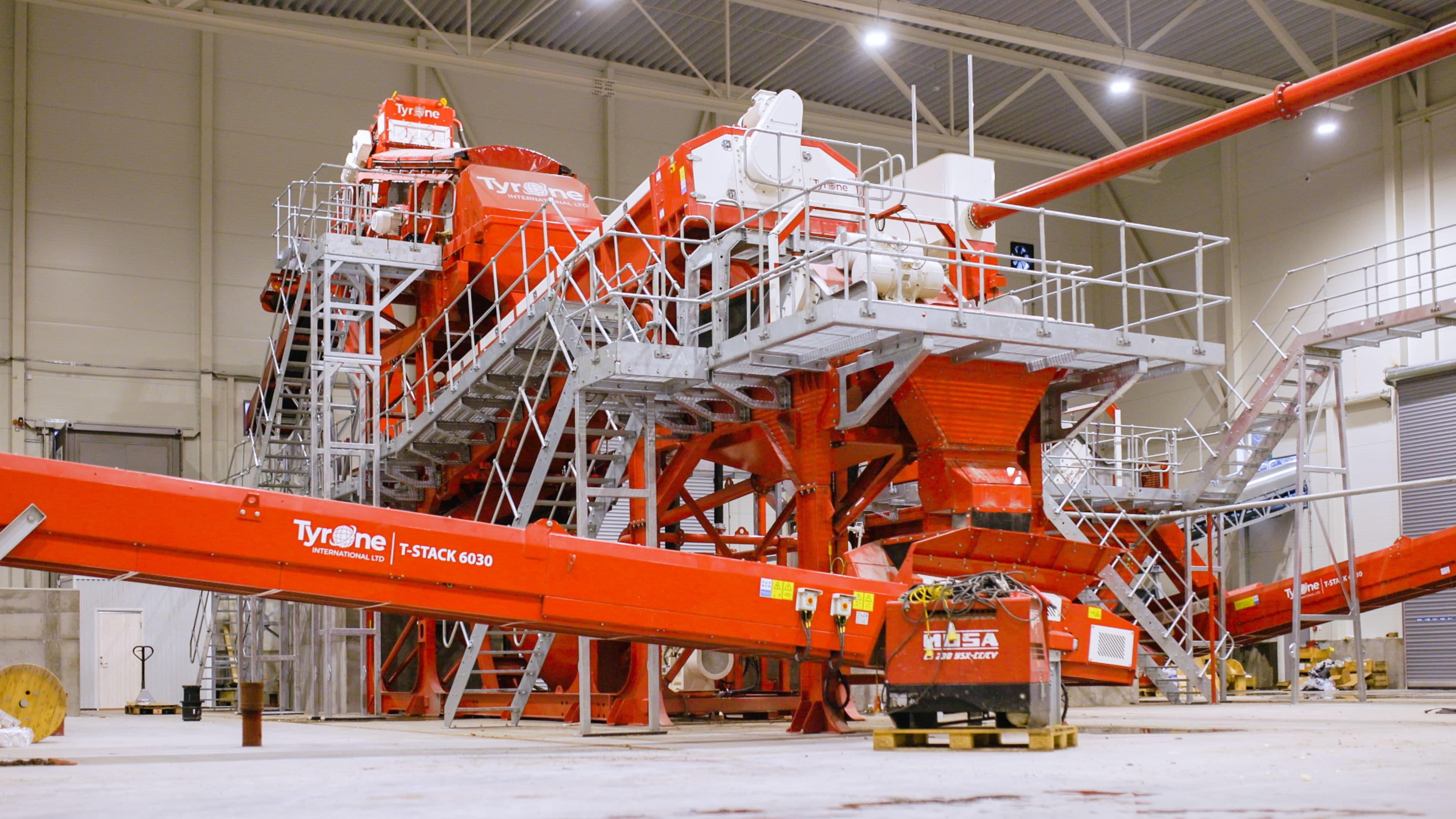 Industrial soil and slurry wash plant and wet processing solution.